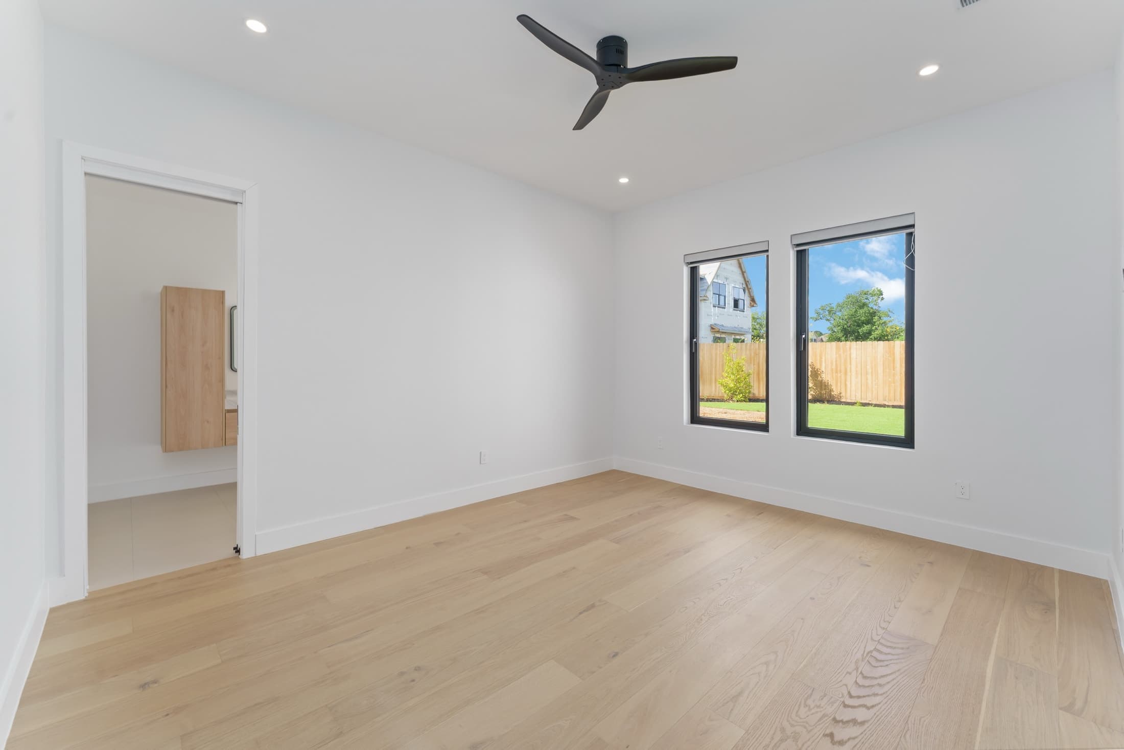 Refined finished bedroom in a renovated luxury home